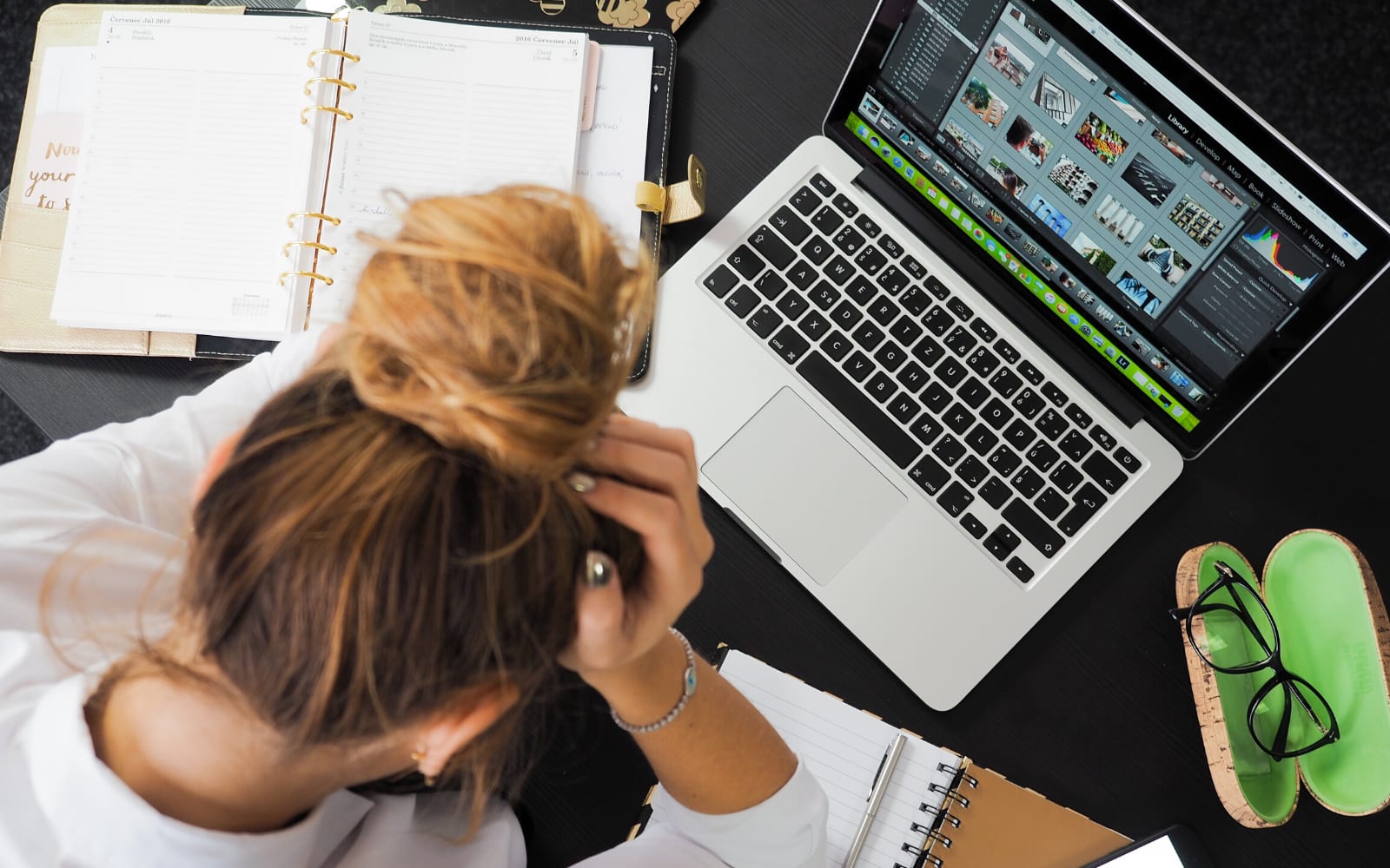 A woman is frustrated because she has been studying without help.